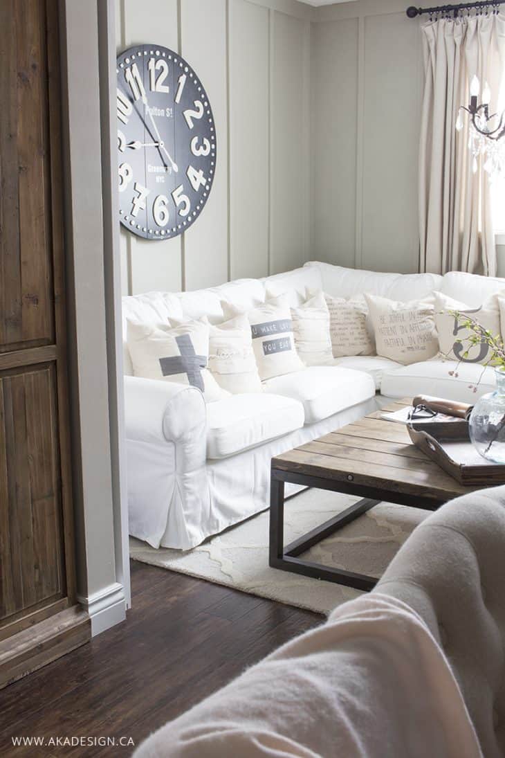 white sectional lots of pillows