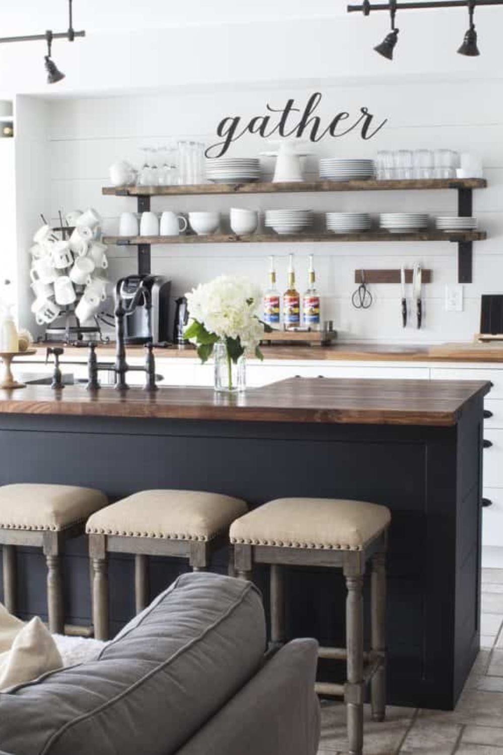 Farmhouse-style kitchen with walnut butcher block counters. Link leads to "What is Farmhouse Style? The Ultimate Guide to Farmhouse Style + Decor" on HomeMadeLovely.com.