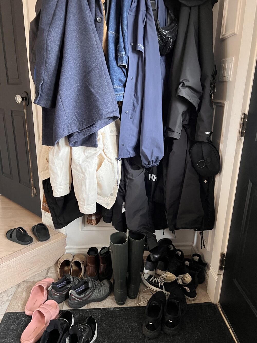 Entry full of coats and shoes