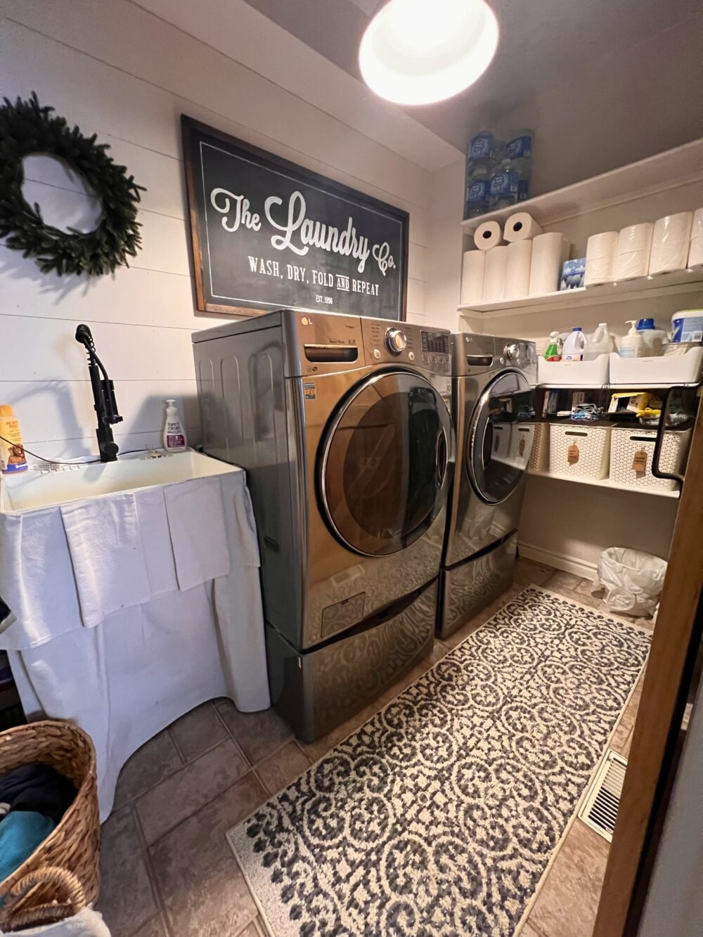 laundry room organized to show how to declutter and organize your home