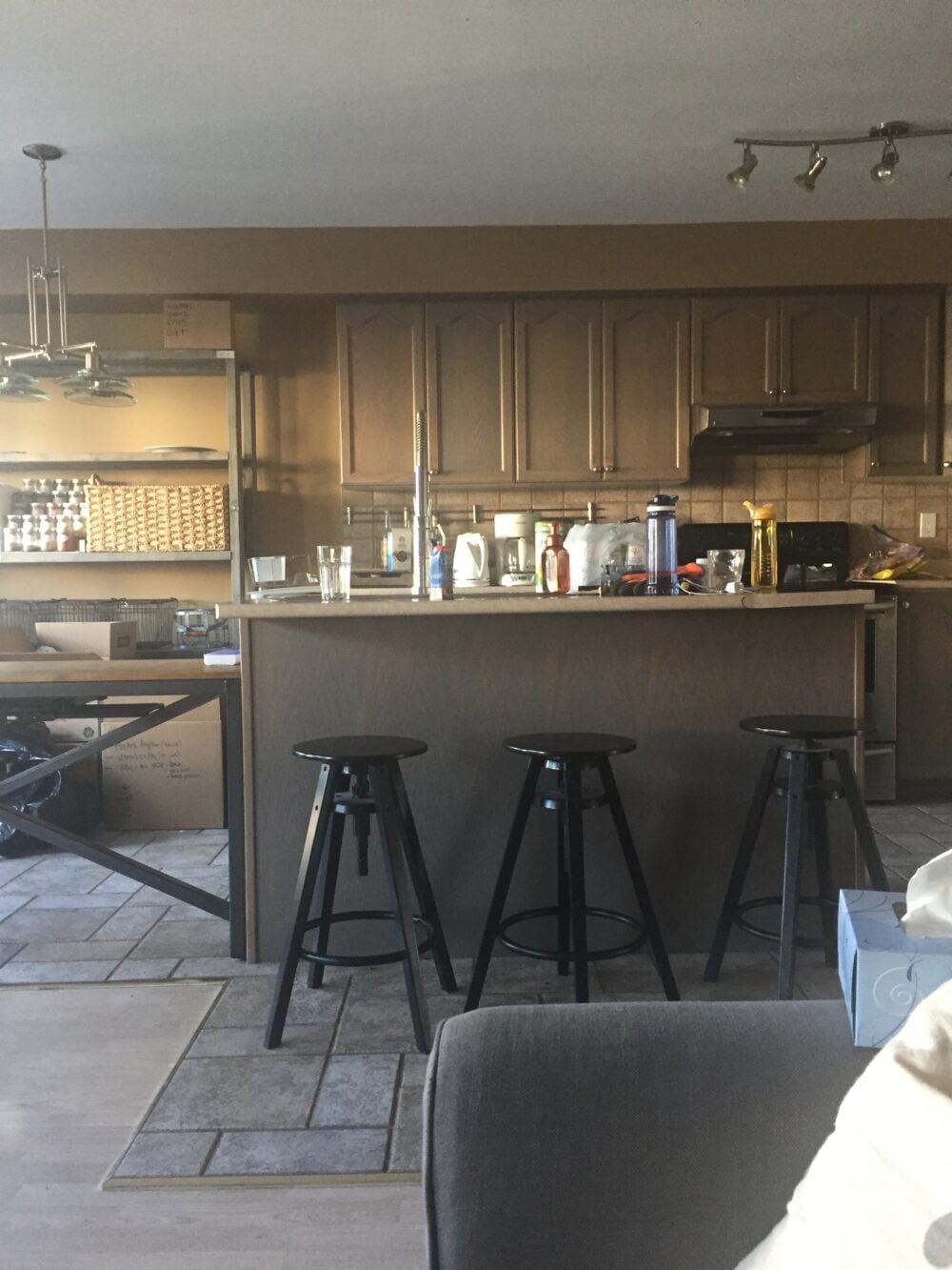 kitchen with stuff all over island