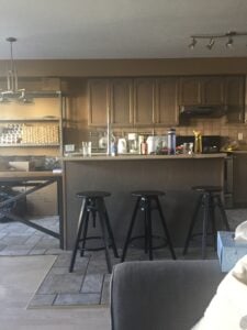 kitchen with stuff all over island