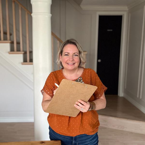 shannon with clipboard to show house mapping