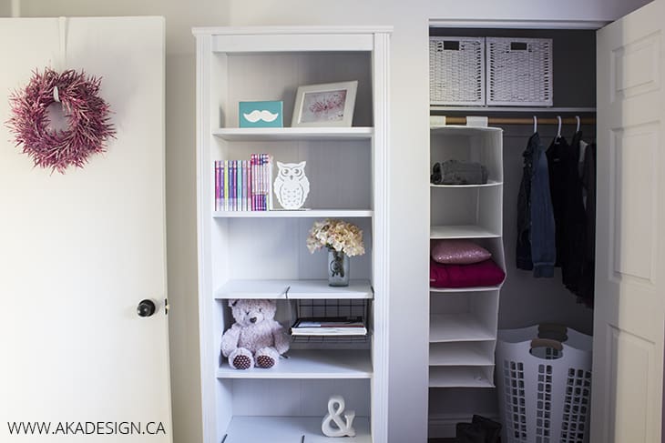 girls room white bookshelves and oopen closet storage