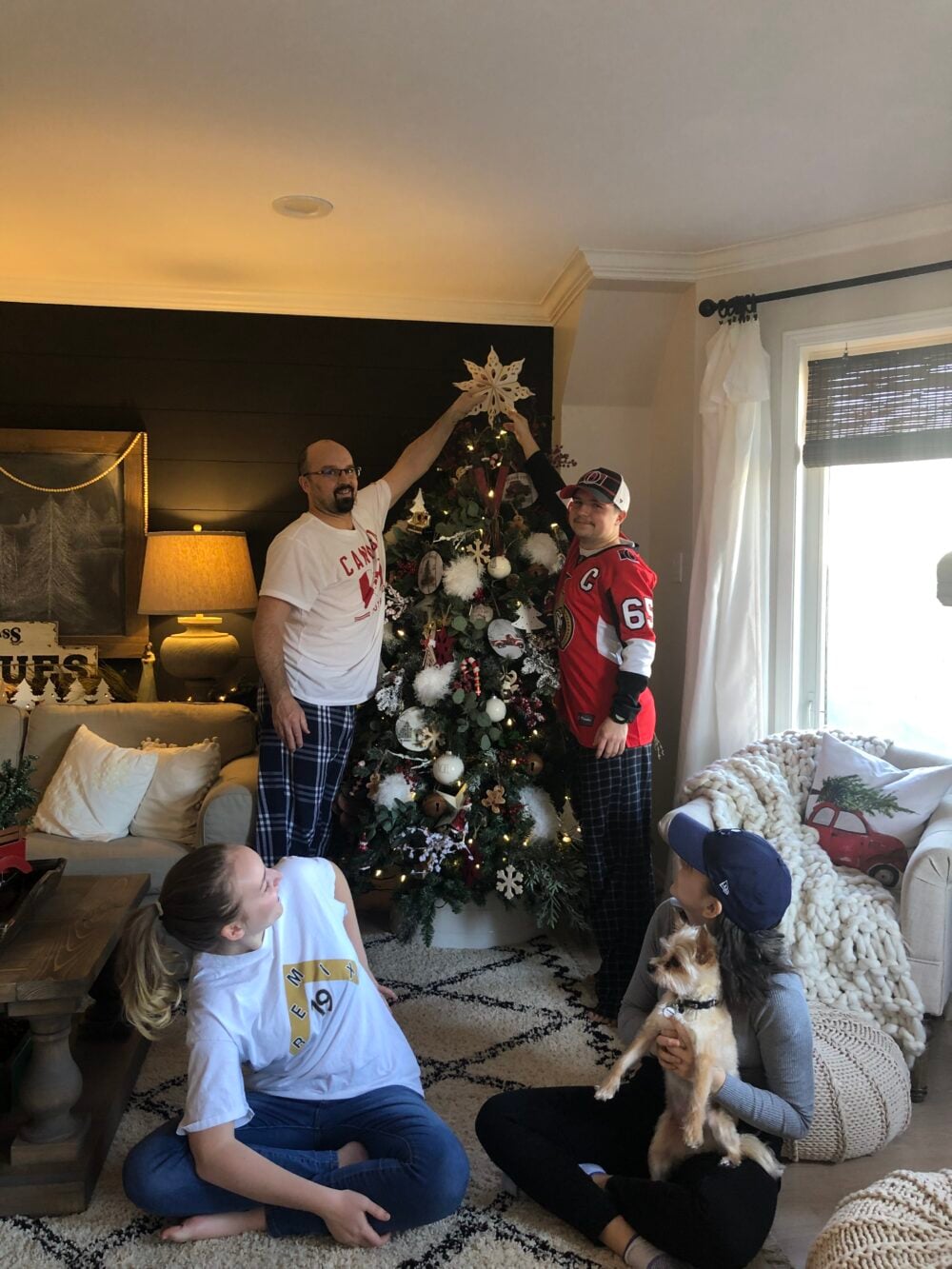 putting the star on the tree