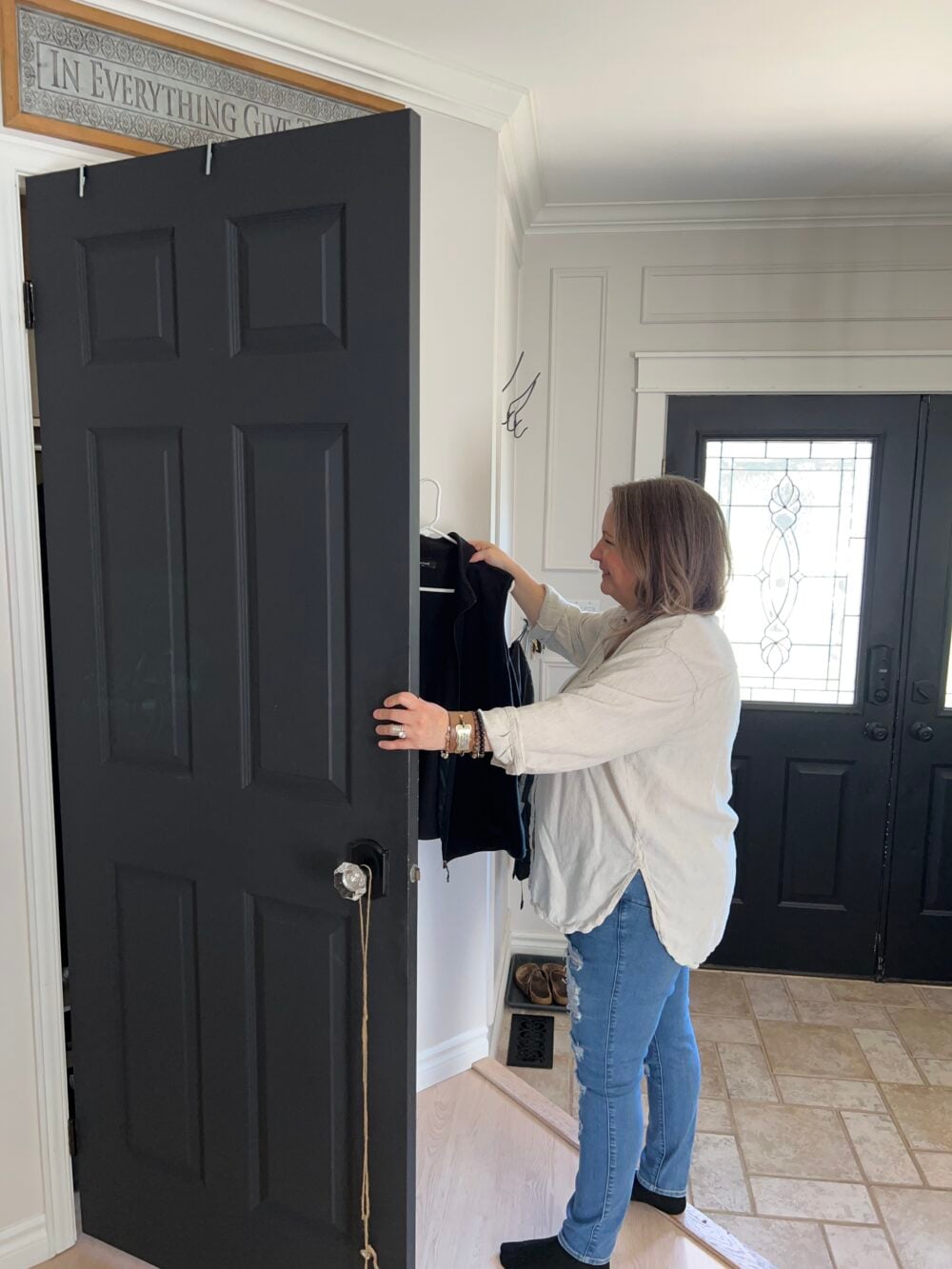 shannon putting vest in closet