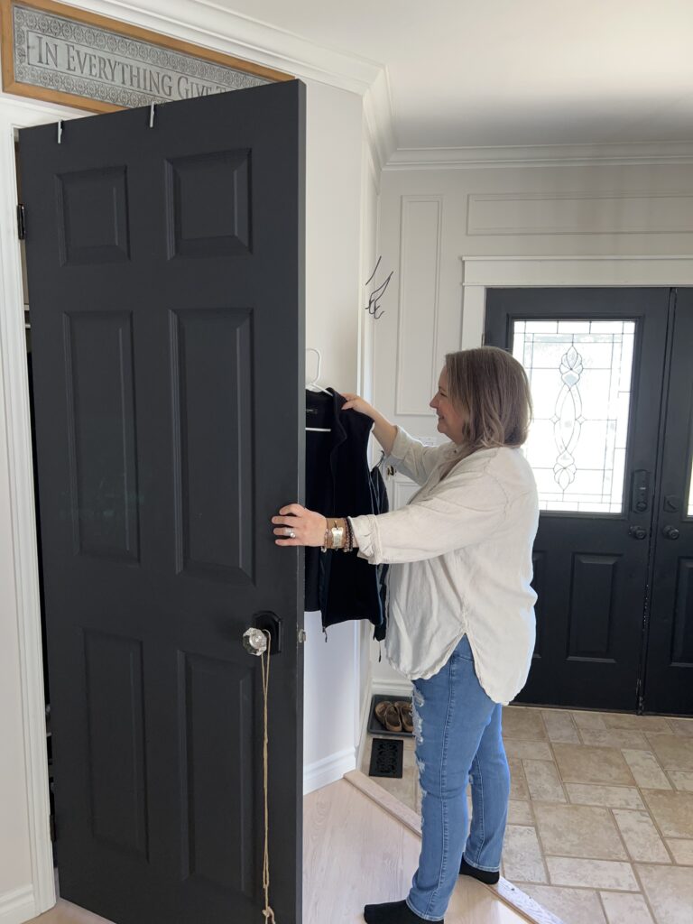 shannon putting vest in closet